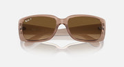 Ray-Ban sunglasses close front view with translucent brown frames and brown lenses.