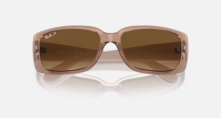 Ray-Ban sunglasses close front view with translucent brown frames and brown lenses.