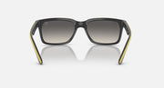 Ray-Ban RB4393M sunglasses, black frames with yellow side accents and grey gradient lenses