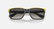 Ray-Ban RB4393M sunglasses, black with yellow rubber trim and dark grey gradient lenses