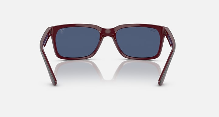 Ray-Ban RB4393M sunglasses, dark red frame with deep blue lenses and angled tips