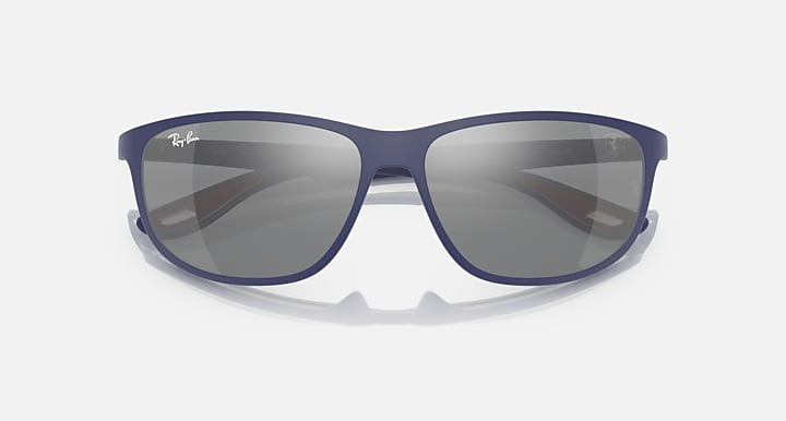 Ray-Ban RB4394M sunglasses, matte blue frame with dark grey gradient lenses