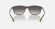 Ray-Ban RB4394M sunglasses, front view with dark frame and yellow temple tips