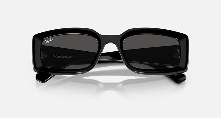 Black square sunglasses with dark grey lenses, slightly angled front view
