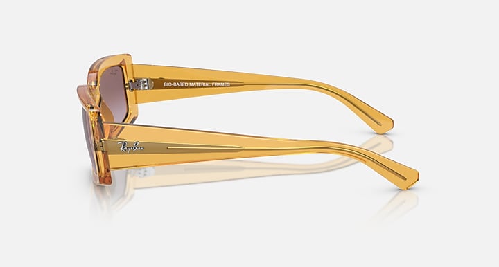 Ray-Ban Kiliane RB4395 sunglasses, amber transparent frame with slim metal arms