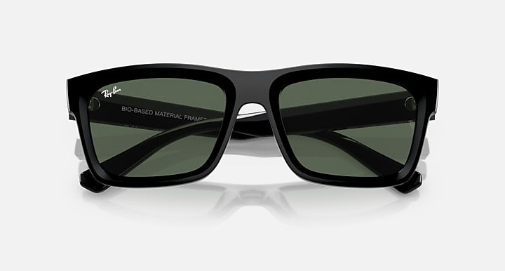 Black sunglasses with dark green lenses and Bio-based material frame detail