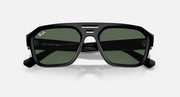 Rectangular sunglasses with black frame and green tinted lenses, front close-up