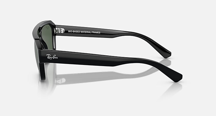 Rectangular sunglasses, black frame with green tinted lenses and visible hinge