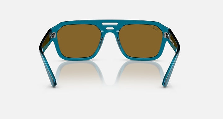 Blue-green rectangular sunglasses with brown lenses and centered nose bridge