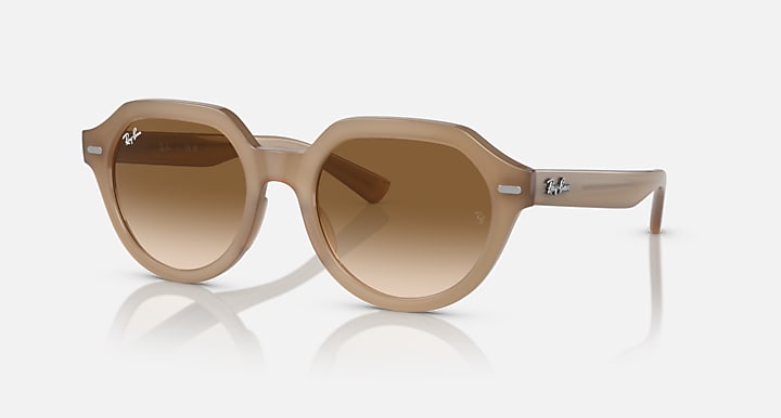 Ray-Ban Gina sunglasses with light tan frame and brown gradient lenses