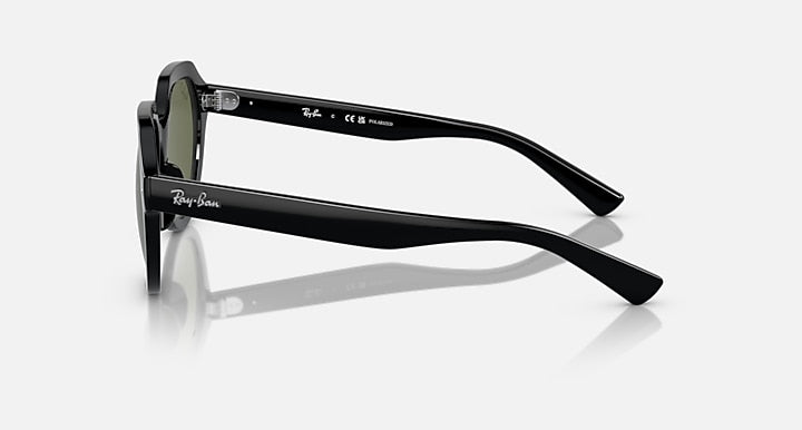 Ray-Ban Gina sunglasses, black frame with angled temples and dark green lenses, side view