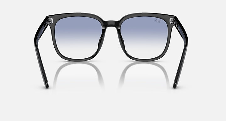 Ray-Ban RB4401D black square sunglasses with blue gradient lenses, front with top rivets