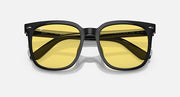 Black sunglasses with yellow mirrored lenses and angular reflections