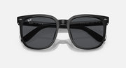 Black sunglasses with dark grey mirrored lenses and wide bridge