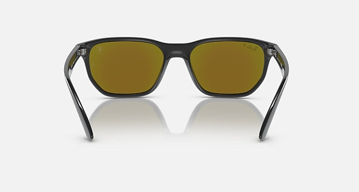 Ray-Ban RB4404M sunglasses, black frames with olive-yellow mirrored lenses