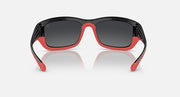 Red-accent sunglasses with dark lenses and black frame, front view