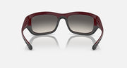 Dark red sunglasses with dark grey lenses and squared frame shape