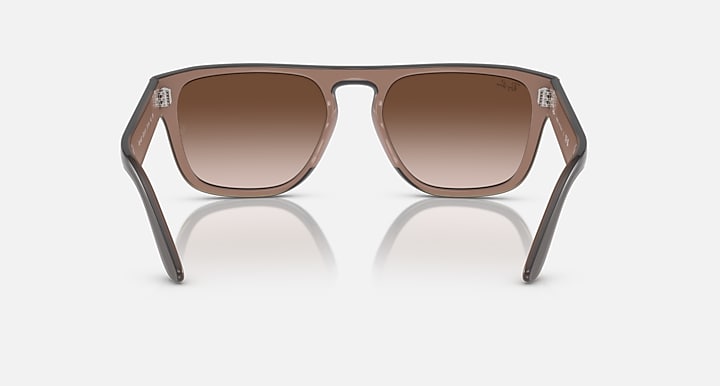 Ray-Ban RB4407 sunglasses, brown frame and light-brown lenses, angled front view