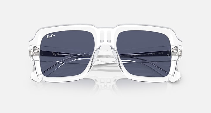 Transparent rectangular sunglasses with dark navy mirrored lenses
