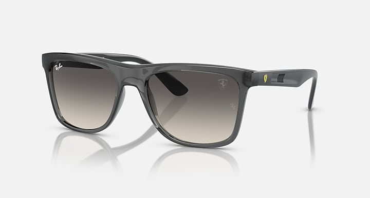 Dark gray wayfarer sunglasses with gradient smoke lenses; Ray-Ban logo on temple.