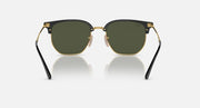 Ray-Ban Clubmaster sunglasses front view with black frames, gold rims, dark green lenses