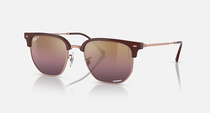 Ray-Ban New Clubmaster RB4416 sunglasses, maroon frame with rose-gold arms and purple lenses
