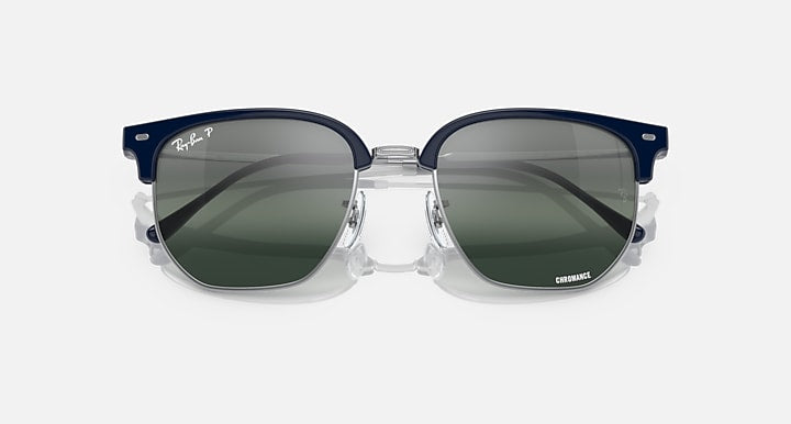 Ray-Ban Clubmaster sunglasses with dark green lenses and blue acetate frame