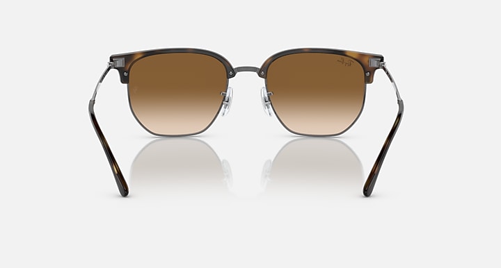 Ray-Ban Clubmaster sunglasses with bronze lenses and dark tortoise frame