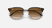 Ray-Ban Clubmaster sunglasses with brown gradient lenses and dark tortoise frame