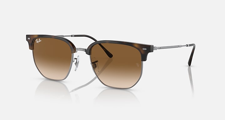 Ray-Ban Clubmaster sunglasses with brown lenses and gold metal frame