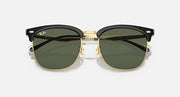 Ray-Ban RB4418D sunglasses, close front, dark green lenses, black frames with gold hardware