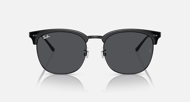 Ray-Ban RB4418D round sunglasses with black frame and dark gray lenses, front view