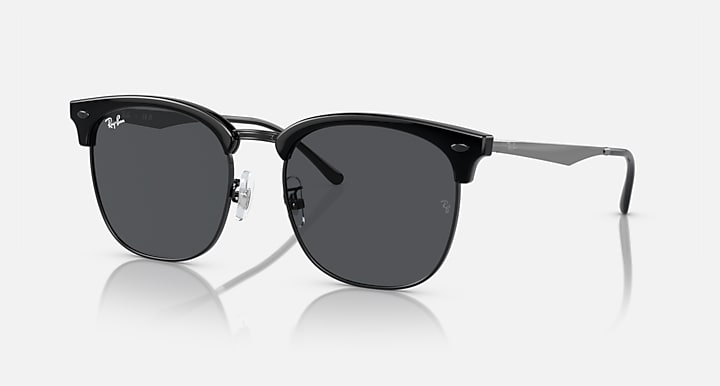 Ray-Ban RB4418D round sunglasses with black frame, dark gray lenses, silver temples