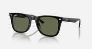 Black Ray-Ban sunglasses with green-tinted lenses and rounded frames