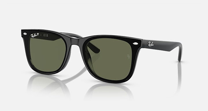 Black Ray-Ban sunglasses with green-tinted lenses and rounded frames