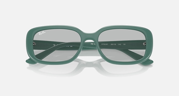 Green Ray-Ban sunglasses with light gray lenses and visible sizing markings