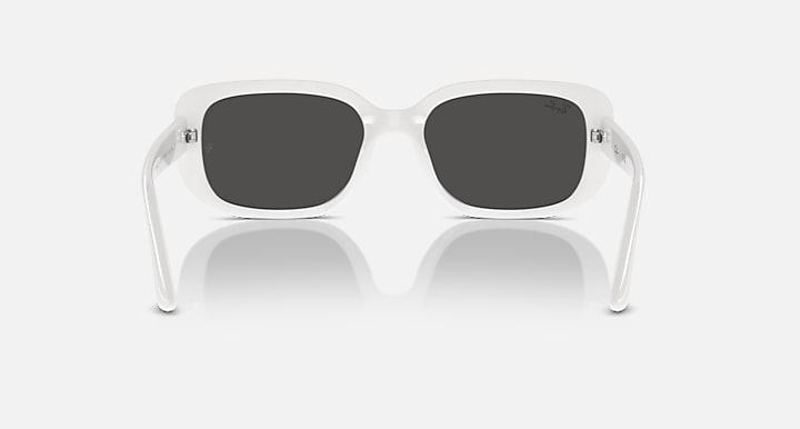 White Ray-Ban RB4421D sunglasses front view with dark grey lenses and white temples.
