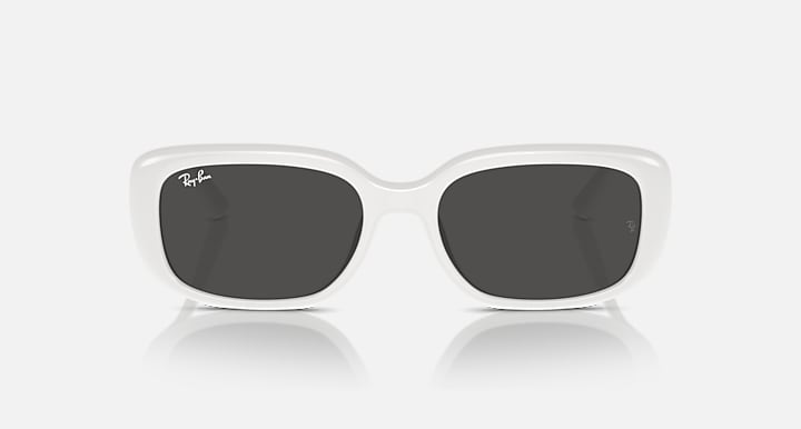 White Ray-Ban RB4421D sunglasses with dark grey lenses and oval-rectangular shape.