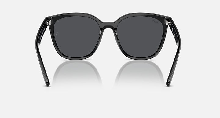 Sunglasses with black frames and dark gray lenses, front angled view