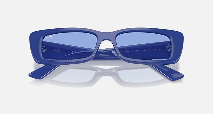 Ray-Ban electric blue rectangular sunglasses with blue tinted lenses, angled view
