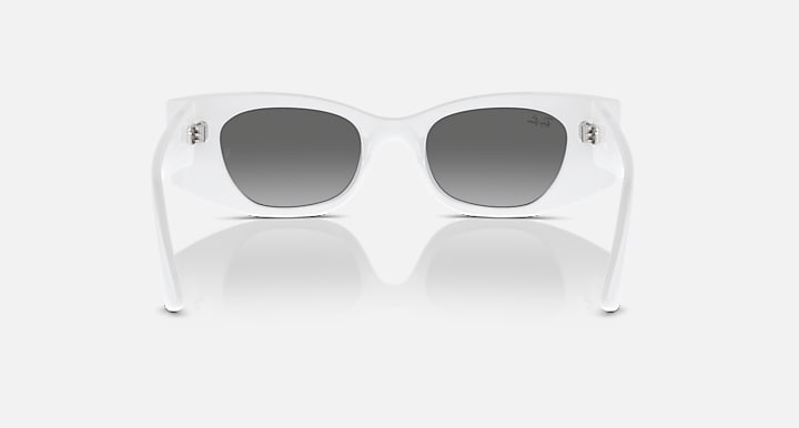 White rectangular sunglasses with dark lenses and branded metal accents on the temples