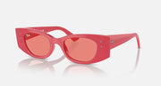 Red sunglasses with pink-tinted lenses and small metallic logo on the temple arms