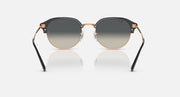 Front view of round sunglasses with black frame, gold trim, and gray gradient lenses