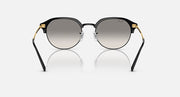 Round sunglasses with black frame and gold accents at the temples; grey lenses.