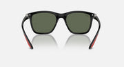 Black sunglasses with dark green lenses and red-accented temple tips