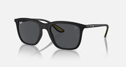 Matte black sunglasses with dark grey lenses and thin metal bridge detail