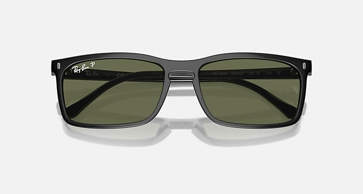 Ray-Ban RB4435 sunglasses front view with dark green lenses and black frame bridge