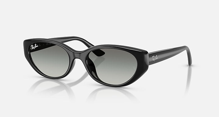 Black cat-eye sunglasses with dark gray mirrored lenses and glossy frame
