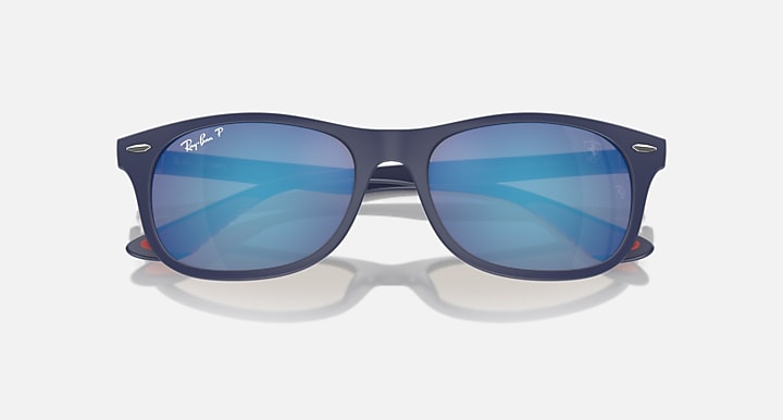 Ray-Ban dark navy sunglasses with blue mirrored lenses and slim bridge