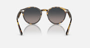 Tortoise round sunglasses angled front with dark grey gradient lenses